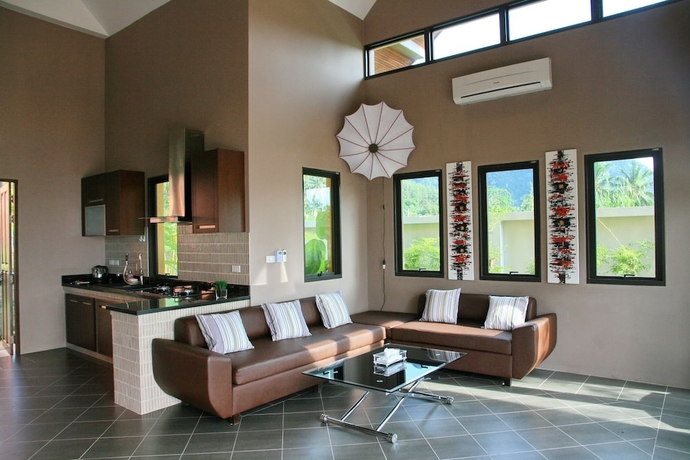 Imagen de la habitación del Hotel Tha Lane Bay Villa. Foto 10