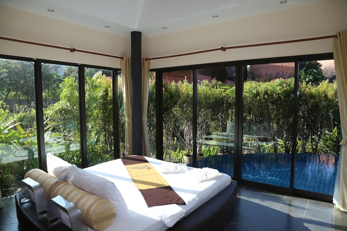 Imagen de la habitación del Hotel Tha Lane Bay Villa. Foto 11