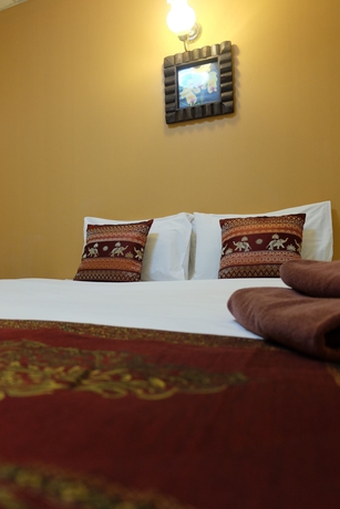 Imagen de la habitación del Hotel Thai Cozy House. Foto 8