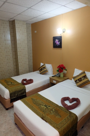 Imagen de la habitación del Hotel Thai Cozy House. Foto 10