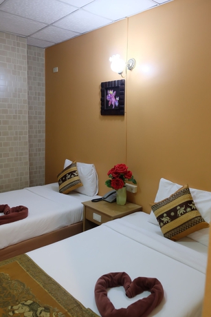 Imagen de la habitación del Hotel Thai Cozy House. Foto 15