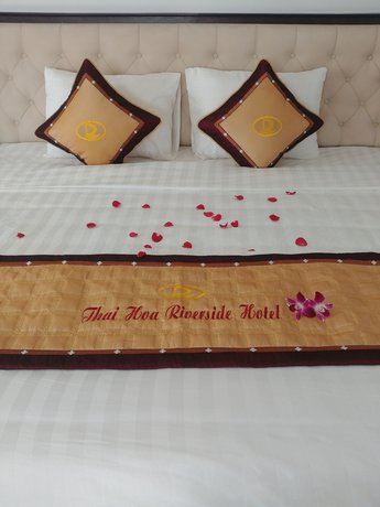 Imagen de la habitación del Hotel Thai Hoa Riverside. Foto 12