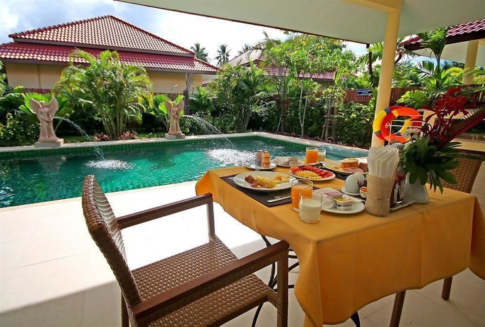 Imagen de la piscina del Hotel Thai Thani Pool Villa Resort. Foto 10