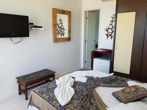 Imagen de la habitación del Hotel Thaiji Pousada e Parador. Foto 11