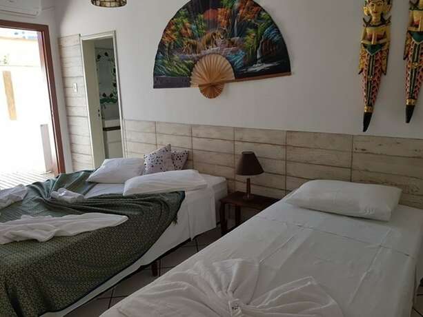 Imagen de la habitación del Hotel Thaiji Pousada e Parador. Foto 17