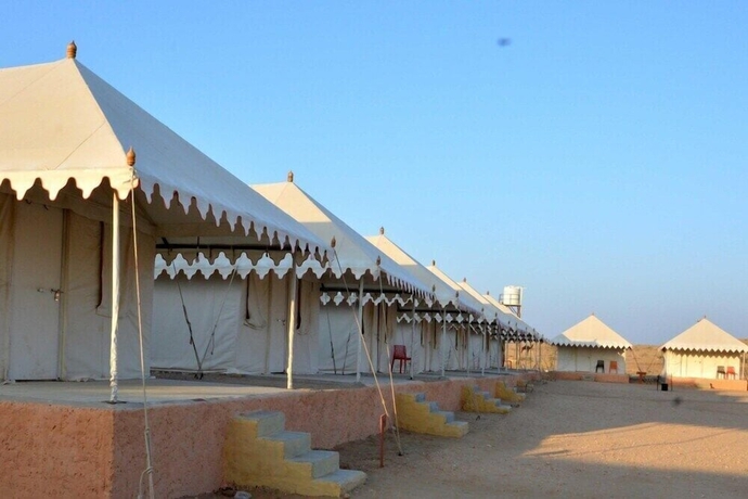 Imagen de la habitación del Hotel Thakur Ji Resort. Foto 14