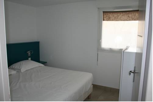 Imagen de la habitación del Hotel Thalacap Résidence. Foto 16