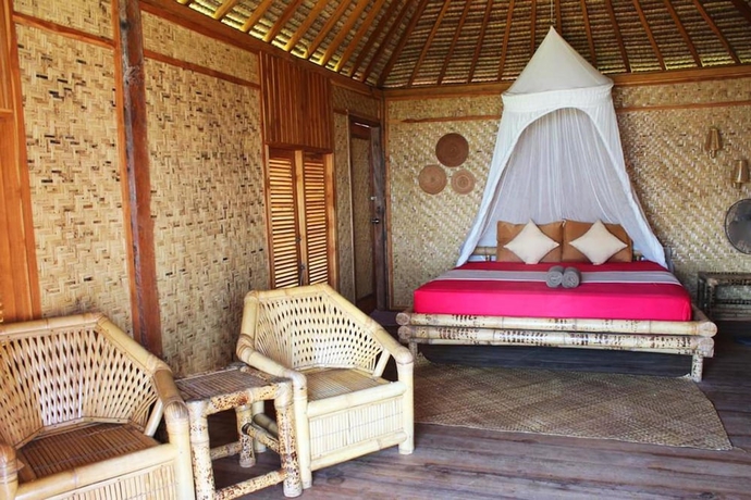 Imagen de la habitación del Hotel Thamarind Resort Gili Gede. Foto 9