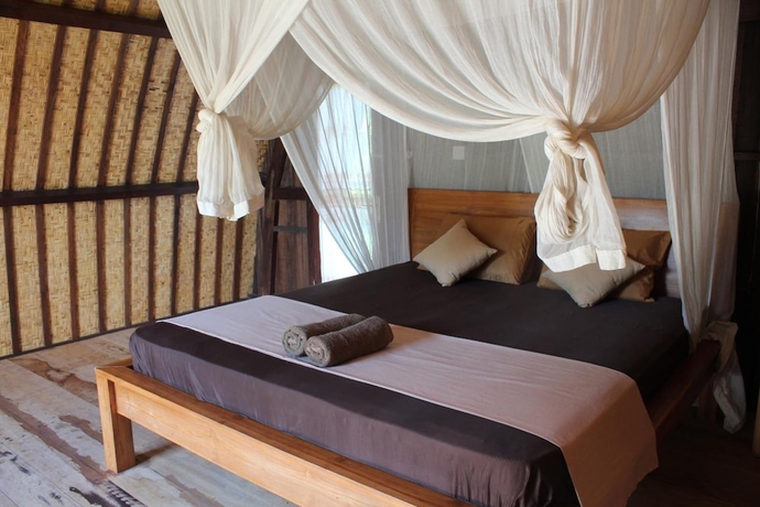 Imagen de la habitación del Hotel Thamarind Resort Gili Gede. Foto 10