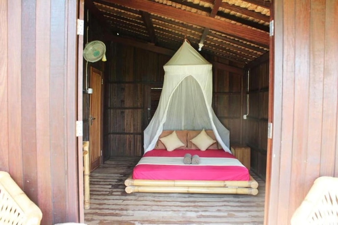 Imagen de la habitación del Hotel Thamarind Resort Gili Gede. Foto 11