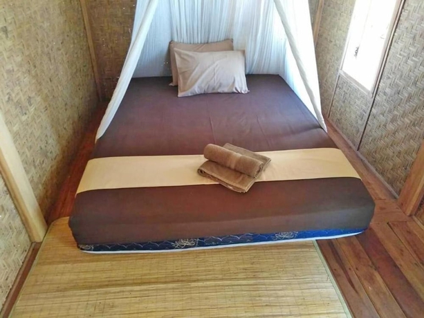 Imagen de la habitación del Hotel Thamarind Resort Gili Gede. Foto 12