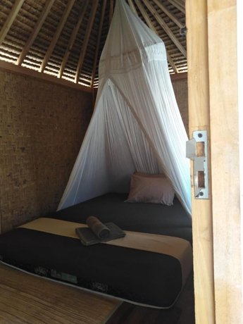 Imagen de la habitación del Hotel Thamarind Resort Gili Gede. Foto 15