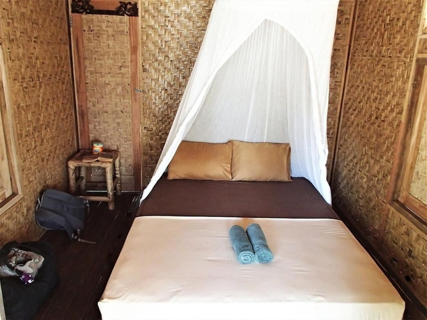 Imagen de la habitación del Hotel Thamarind Resort Gili Gede. Foto 16
