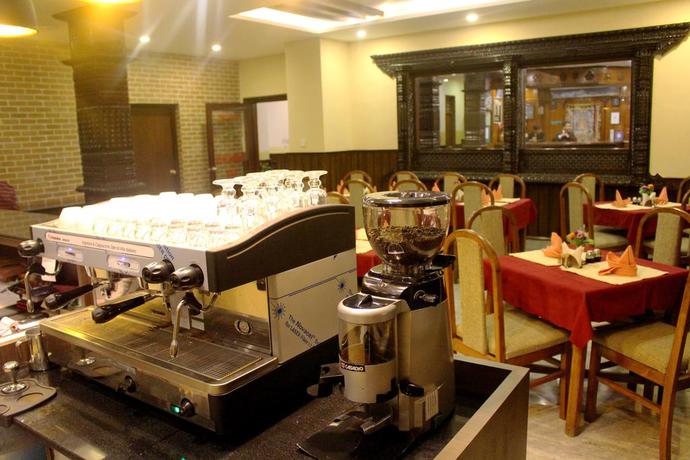 Imagen del bar/restaurante del Hotel Thamel. Foto 3