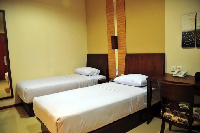 Imagen de la habitación del Hotel Thamrin Condotel Jakarta. Foto 3