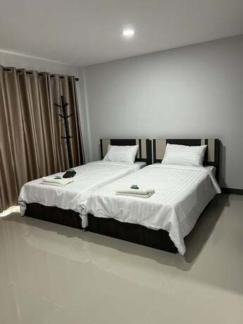 Imagen de la habitación del Hotel Thana Apartment. Foto 18