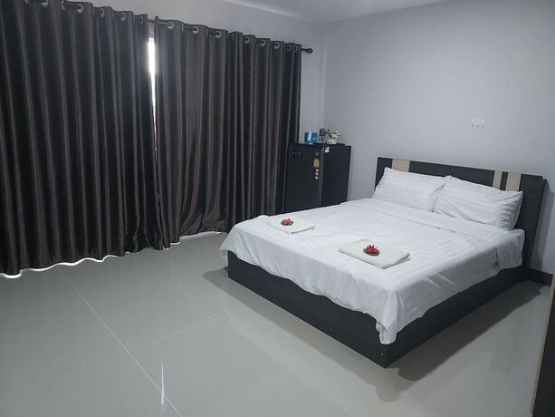 Imagen de la habitación del Hotel Thana Apartment. Foto 20
