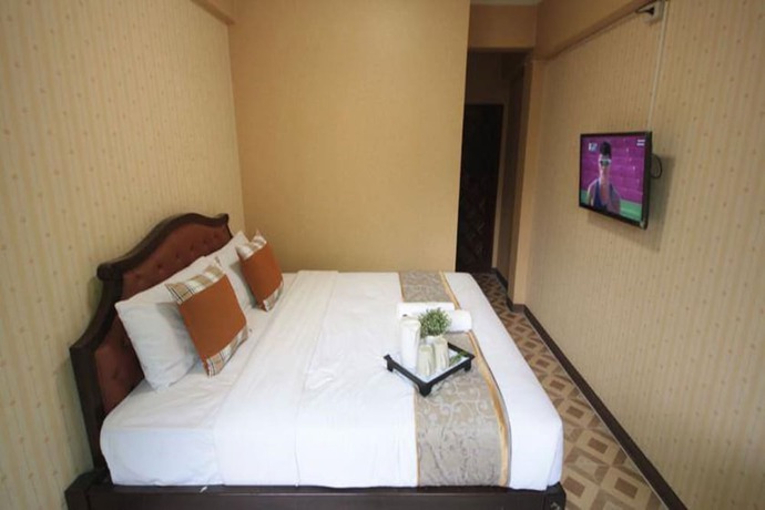 Imagen de la habitación del Hotel Thana Hotel. Foto 6