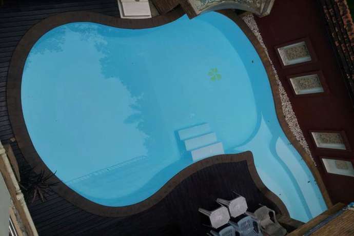 Imagen de la piscina del Hotel Thana Hotel. Foto 20