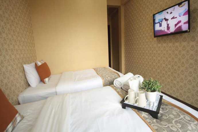 Imagen de la habitación del Hotel Thana Hotel. Foto 10