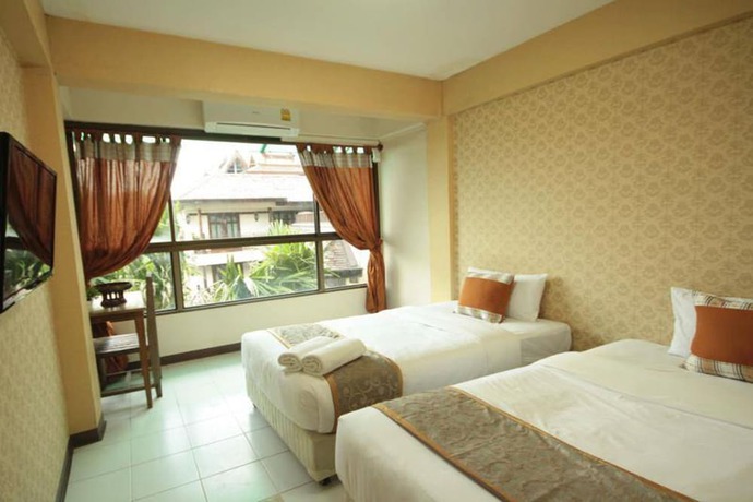Imagen de la habitación del Hotel Thana Hotel. Foto 11