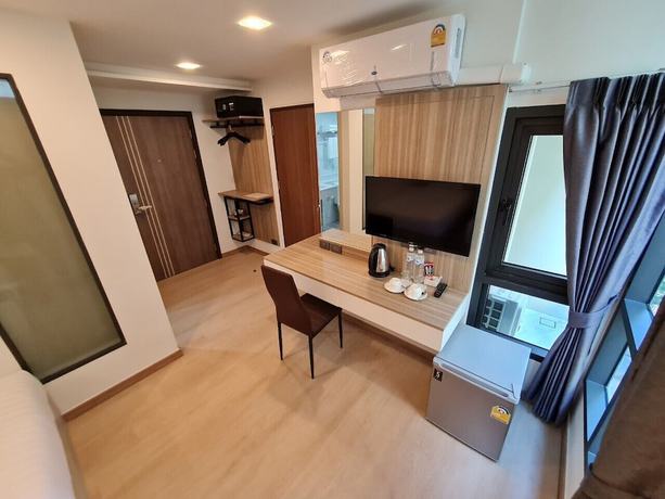 Imagen de la habitación del Hotel Thana Wisut. Foto 9