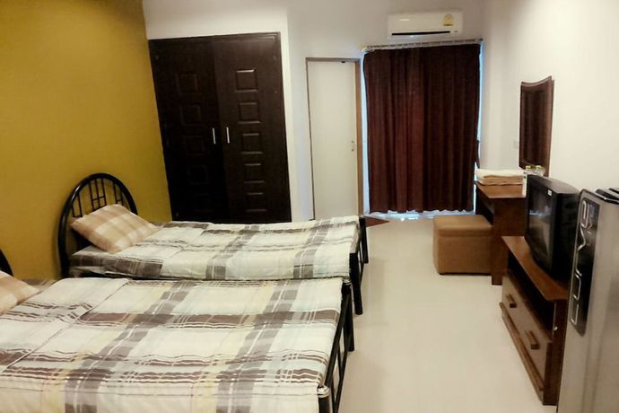 Imagen de la habitación del Hotel Thanarom Place. Foto 9