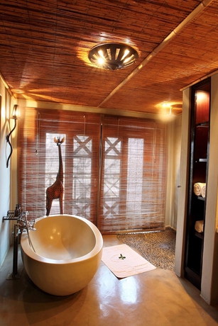 Imagen de la habitación del Hotel Thanda Safari. Foto 12