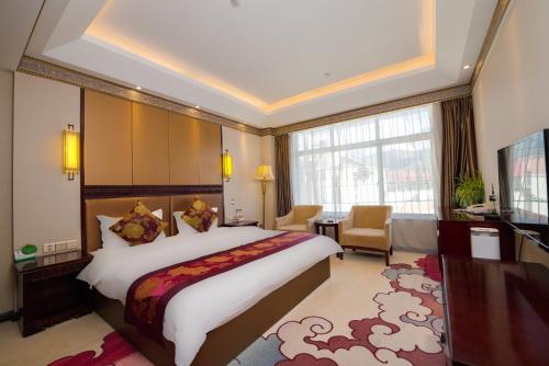 Imagen de la habitación del Hotel Thangka. Foto 13