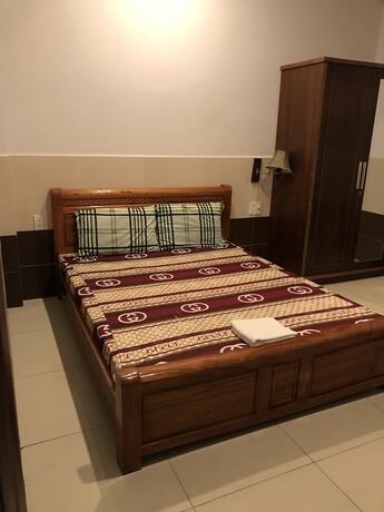 Imagen de la habitación del Hotel Thanh Dat, Thuan An. Foto 16
