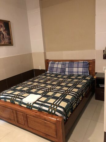 Imagen de la habitación del Hotel Thanh Dat, Thuan An. Foto 17