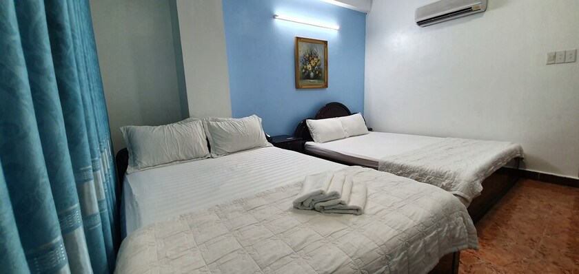 Imagen de la habitación del Hotel Thanh Lan. Foto 9