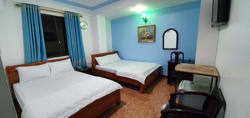 Imagen de la habitación del Hotel Thanh Lan. Foto 10