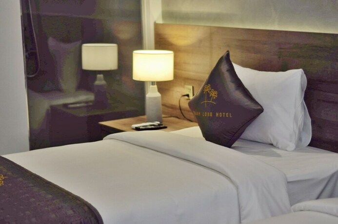 Imagen de la habitación del Hotel Thanh Long. Foto 12