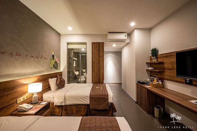 Imagen de la habitación del Hotel Thanh Long. Foto 22