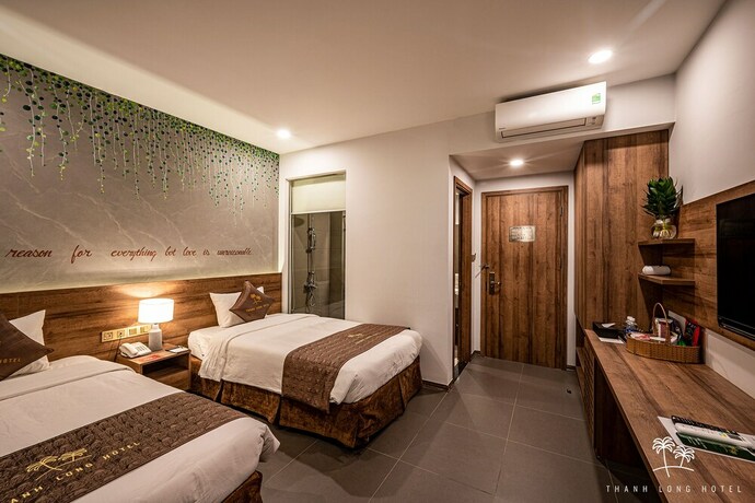 Imagen de la habitación del Hotel Thanh Long. Foto 24