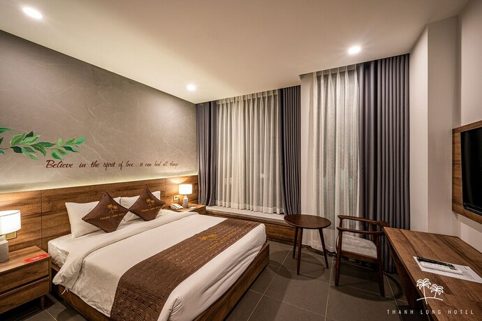 Imagen de la habitación del Hotel Thanh Long. Foto 31