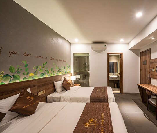 Imagen de la habitación del Hotel Thanh Long. Foto 34