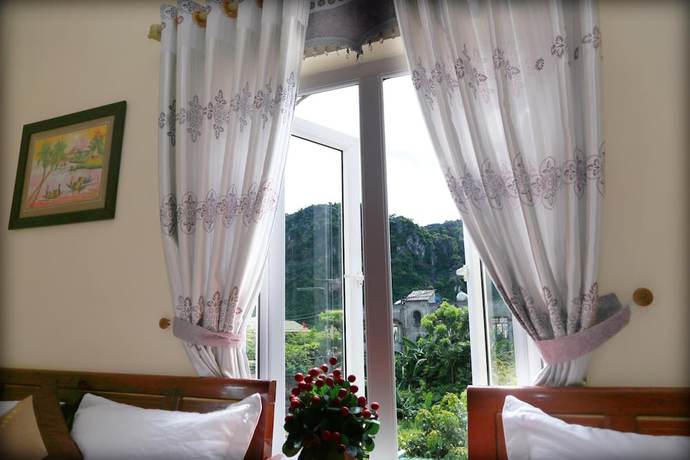 Imagen de la habitación del Hotel Thanh Phat Phong Nha. Foto 17