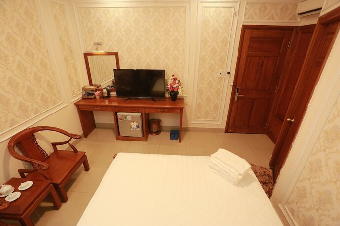 Imagen de la habitación del Hotel Thanh Tai. Foto 26