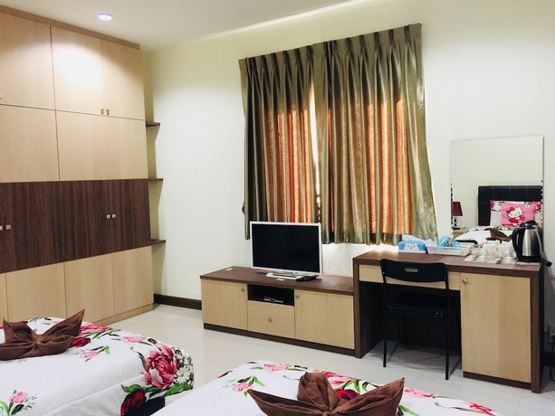 Imagen de la habitación del Hotel Thani Residence. Foto 7