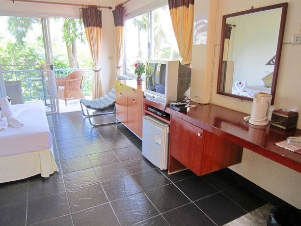 Imagen de la habitación del Hotel Thaniza Beachfront Resort. Foto 7