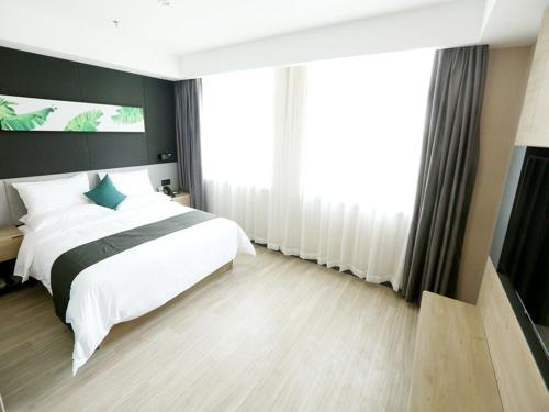 Imagen de la habitación del Hotel Thank Inn Chain Beijing Fanshan Chengguan Town Fangshan Red Scarf Park. Foto 20