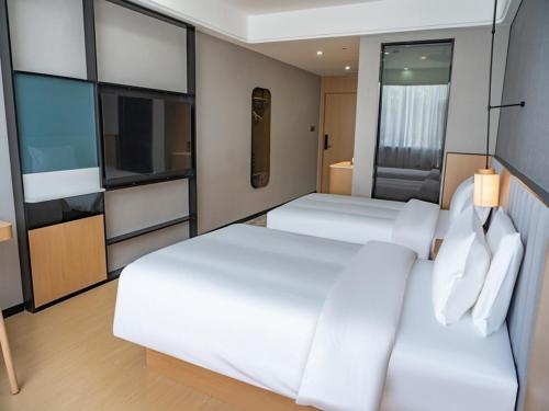 Imagen de la habitación del Hotel Thank Inn Chain Kashgar Ancient City Wanda. Foto 11