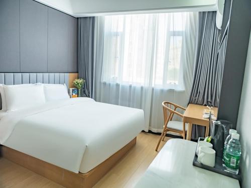 Imagen de la habitación del Hotel Thank Inn Chain Kashgar Ancient City Wanda. Foto 14