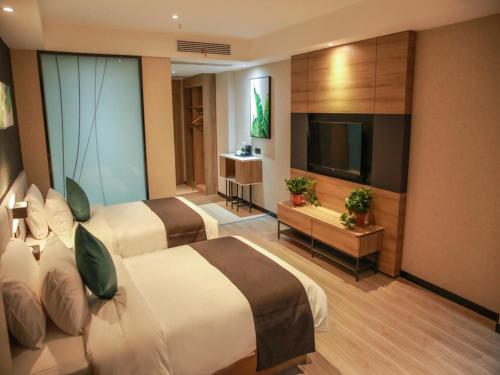 Imagen de la habitación del Hotel Thank Inn Chain Suqian Hubin New District Santaishan Park. Foto 18