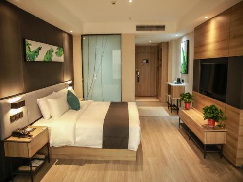 Imagen de la habitación del Hotel Thank Inn Chain Suqian Hubin New District Santaishan Park. Foto 20