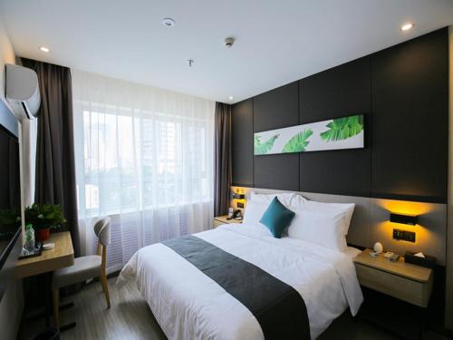 Imagen de la habitación del Hotel Thank Inn Chain Xianyang Renmin Road Central Plaza. Foto 14