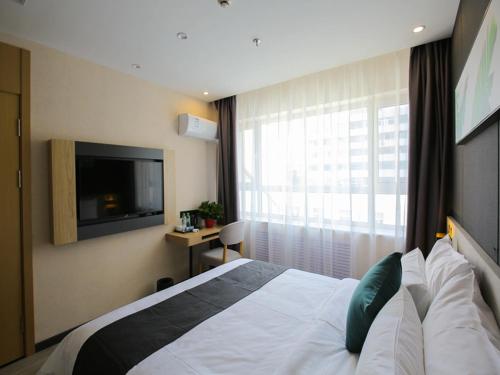 Imagen de la habitación del Hotel Thank Inn Chain Xianyang Renmin Road Central Plaza. Foto 15