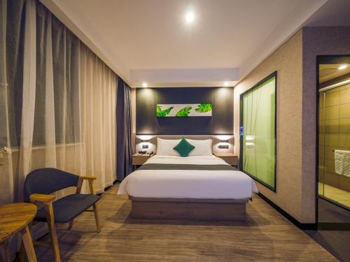 Imagen de la habitación del Hotel Thank Inn Chain Xianyang Renmin Road Central Plaza. Foto 19